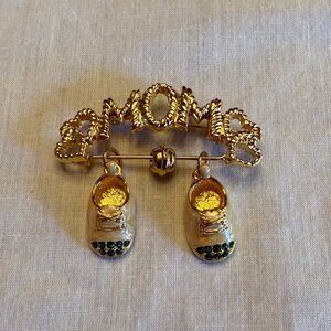 Firenza Gold Tone "Mom" Pin With Enamel Crystal Baby Shoe Charms